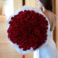 100 premium red roses bouquet by Mamma Mia Flower Studio in Miami