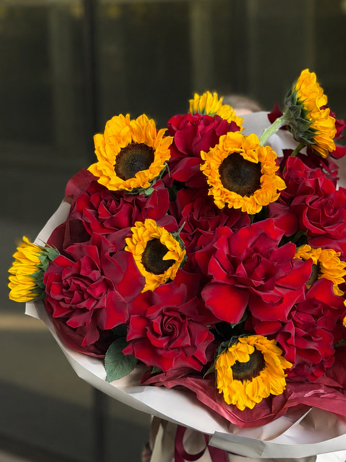 • Ruby • red roses and sunflowers bouquet