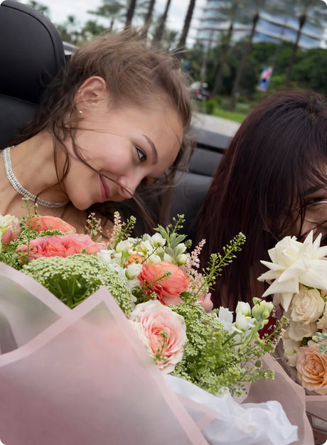 Woman with flowers from Mamma Mia flowers