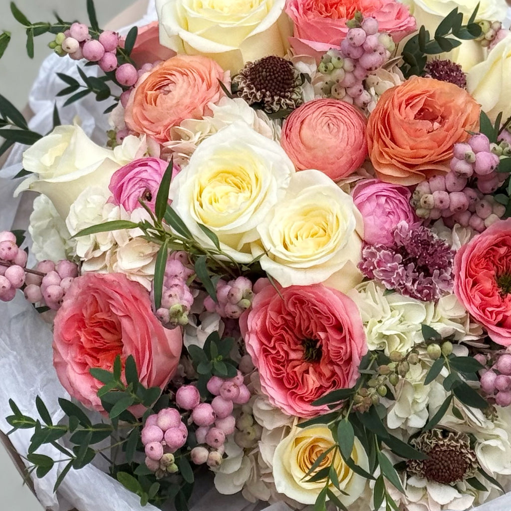 Luxury flower selection  bouquet crafted with premium garden roses, ranunculuses and available for same-day flower delivery in Miami. Designed by Mamma Mia Flower Studio, a local Miami florist known for elegant bouquets and beautiful floral gifts. Order online today for a romantic surprise or special occasion.