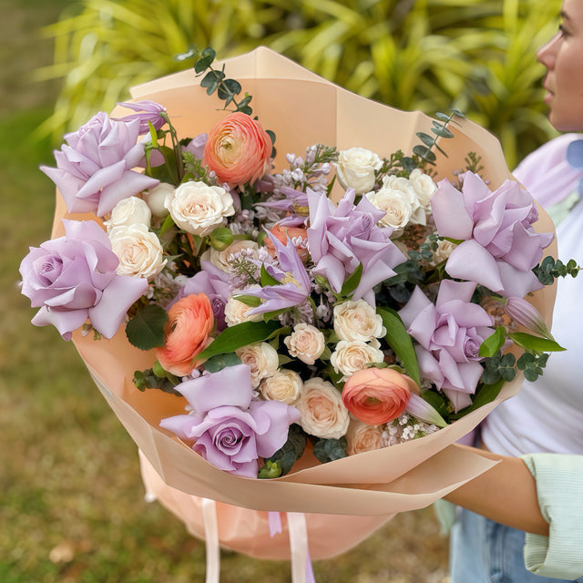 Bouquet with Purple French Roses and Ranunculuses available for same day delivery in Miami