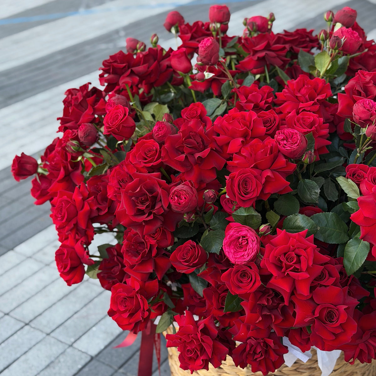 Large red rose basket prepared for flower delivery in Miami