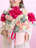 Luxury hot pink flower box with garden roses and ranunculus
