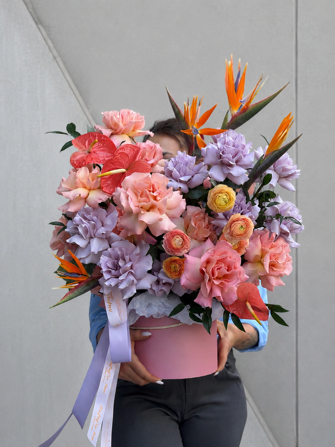Luxury purple roses and Birds of Paradise arrangement for flower delivery in Miami
