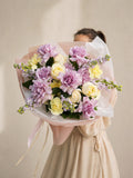 Purple roses bouquet by Mamma Mia Flower Studio
