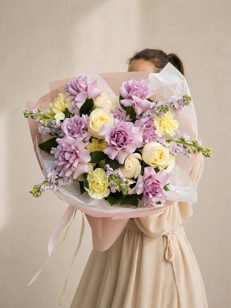 Purple roses bouquet by Mamma Mia Flower Studio