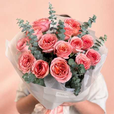 Bouquet of pink roses with eucalyptus from Mamma Mia Flowers available for same day delivery in Miami