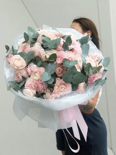 Premium pink ranunculus bouquet with eucalyptus for flower delivery in Miami