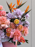 Luxury flower box with purple French roses and Birds of Paradise in Miami