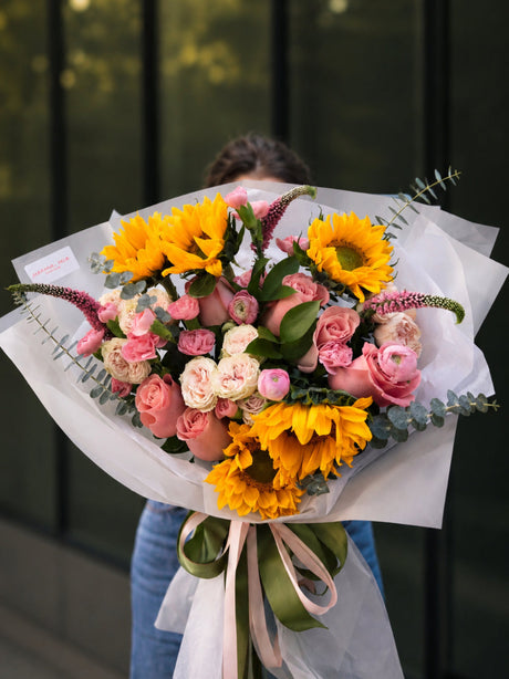 Sunflowers and pink garden roses bouquet for flower delivery in Miami