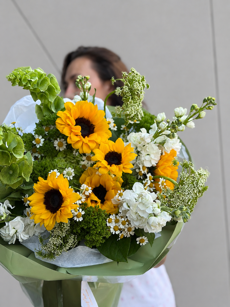 Sunflowers and white seasonal flowers bouquet handcrafted in Miami