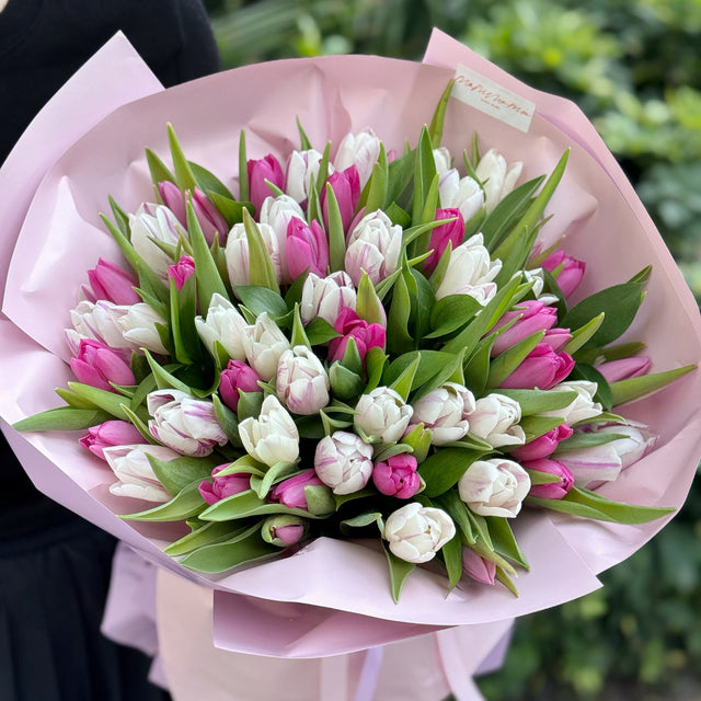 Premium bouquet crafted with fresh white and pink tulips and available for same-day flower delivery in Miami. Designed by Mamma Mia Flower Studio, a local Miami florist known for elegant bouquets and beautiful floral gifts. Order online today for a romantic surprise or special occasion.