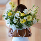 Yellow and white flower basket for flower delivery in Miami