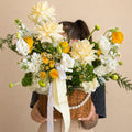 Yellow and white flower basket for flower delivery in Miami